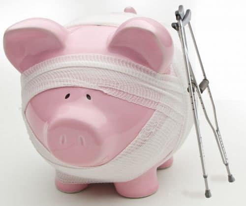 piggy bank in bandages e1559762666175